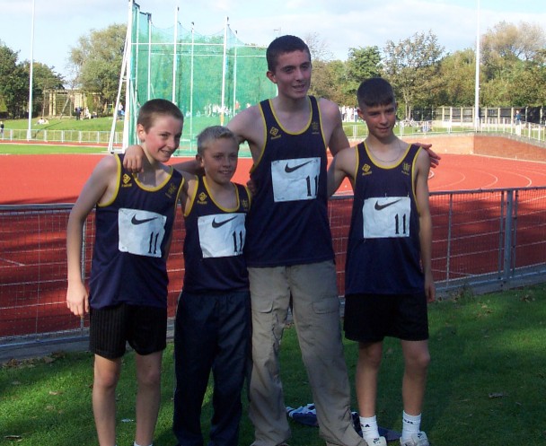 Northern Road Relays 2002 - U15 boys team celebrate bronze medal. Left to Right - James Johnson, Steve Feasey, Rob Hodges, Jack Van Renn